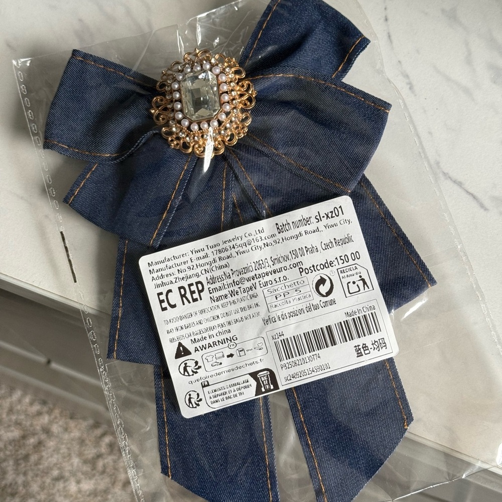 Elegant Blue Bow Brooch with Gold Accent - Picture 4 of 11